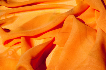 Background texture pattern. Silk crepe of chiffon peach peachpuff Introducing the sultry and...