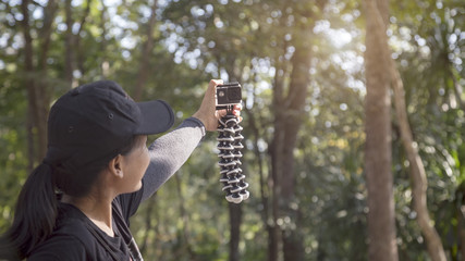 Young woman selfie action cam enjoy with nature