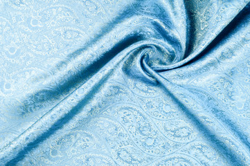 Background texture, pattern. Blue paisley silk chiffon mod fabric by the yard. Crinkled, flowy,...