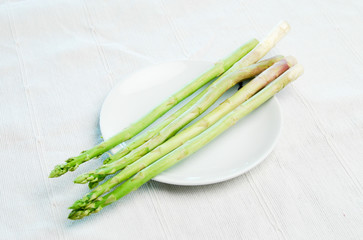 green asparagus on plate