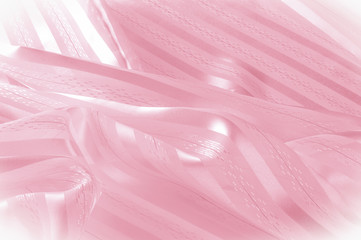 Background texture, pattern. Pink silk fabric with a light stripe. A smooth elegant pink silk or...