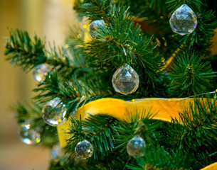 Christmas decorations on the branches of fir tree
