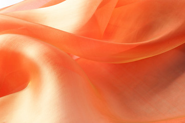 Texture, background, pattern. Orange Silk Fabric for Drapery Abstract Background. Abstract Fabric...