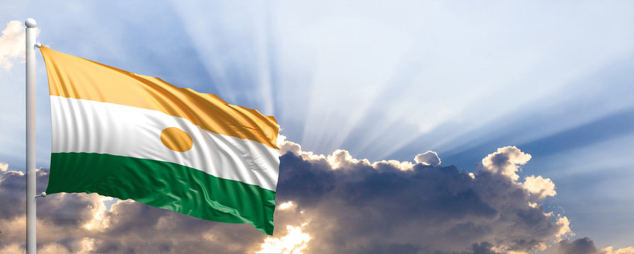 Niger flag on blue sky. 3d illustration
