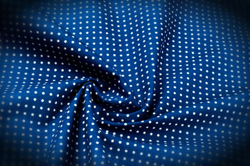 Texture background pattern. Abstract background of a luxurious blue fabric in white polka dots wavy...
