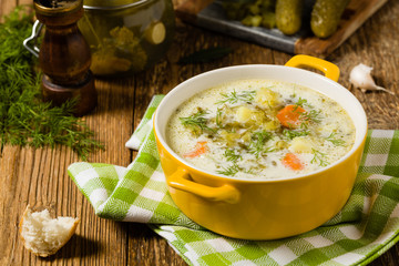 Traditional cucumber soup with pickled cucumbers.