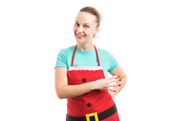 Housewife wearing red Christmas apron showing number four