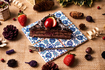 Piece of homemade Christmas chocolate cake