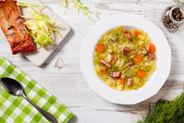 Homemade cabbage soup, cooked on smoked ribs.