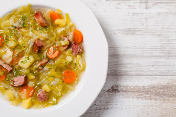 Homemade cabbage soup, cooked on smoked ribs.