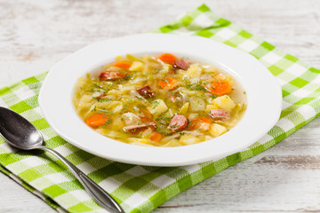 Homemade cabbage soup, cooked on smoked ribs.