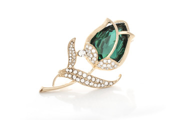 gold brooch rose bud with emerald and diamonds isolated on white - obrazy, fototapety, plakaty