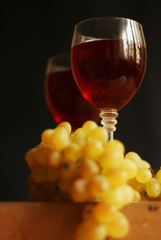 Grape branch and wine goblet