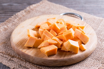 Pumpkin pieces on a cutting board