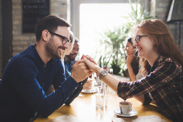 Couple eating out and dating in restaurant