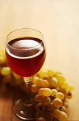 Grape branch and wine goblet