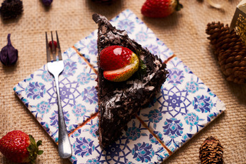 Piece of homemade Christmas chocolate cake