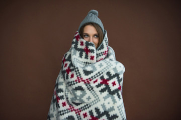 woman wrapped in blanket