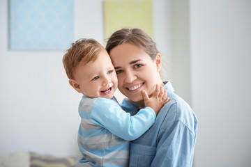 Woman with her baby at home