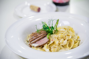 Chef s specialty presented in restaurant on served table
