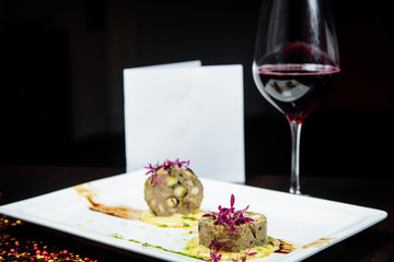 Chef s specialty presented in restaurant on served table