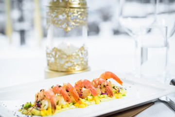 Chef s specialty presented in restaurant on served table