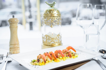 Chef s specialty presented in restaurant on served table