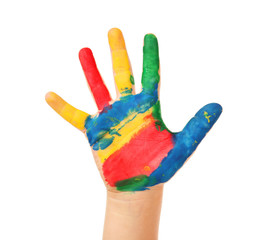 Child's hand in paint on white background
