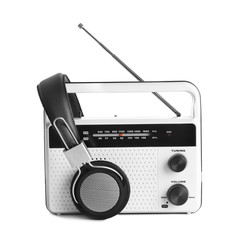 Retro radio and headphones, isolated on white