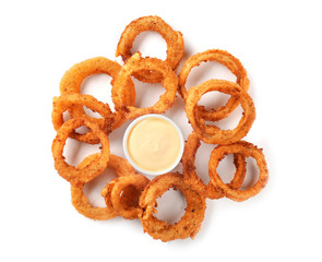 Fried onion rings with sauce on white background