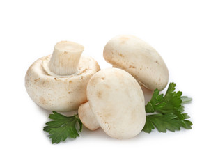 Fresh champignon mushrooms on white background