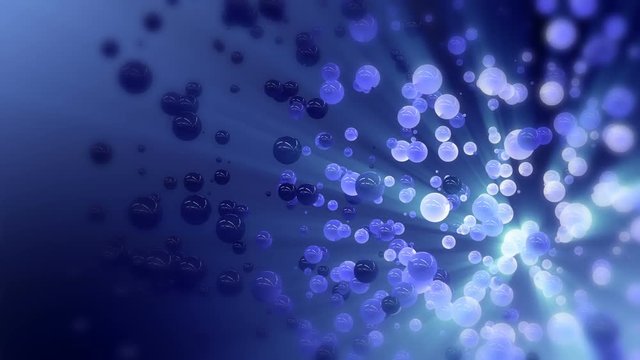 Abstract background with blue speres of different size glowing in the dark