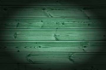 Texture, background, pattern. The green-colored boards are seen from above as a background with space for copying and assembling.