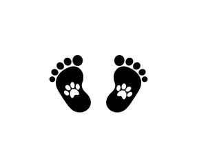 Animal pawprints inside of baby footprints.