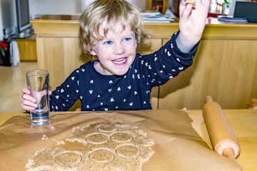 Child at the cookie baking