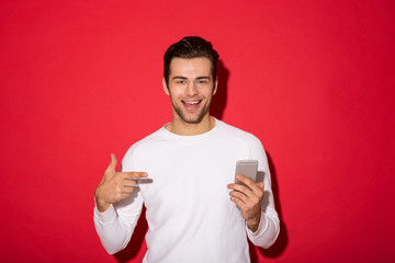 Picture of smiling man in sweater looking at the camera