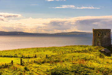 An abandoned building overlooking the ocean in the Isle of SKye, Scotland