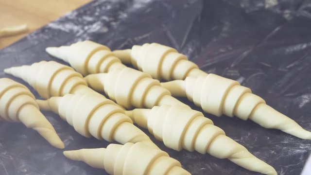 hands of the chef prepare croissants. 4k