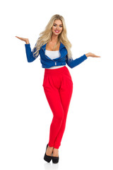 Smiling Sexy Woman Is Standing And Presenting Something