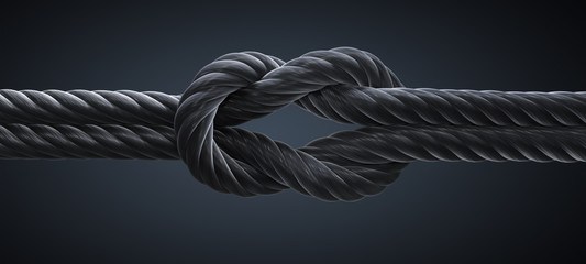 Kreuzknoten mit dunklem Seil vor dunklem Hintergrund - obrazy, fototapety, plakaty