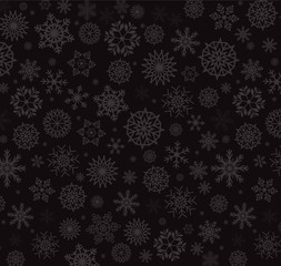 Silver snow flakes on charoal black background.