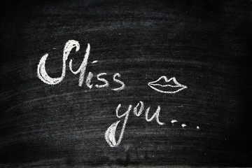 Miss You Saying On A Black Chalkboard