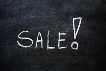 Obraz premium Sale Written On Black Chalkboard