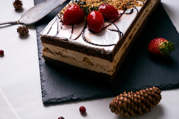 Homemade Christmas cake with fresh strawberries