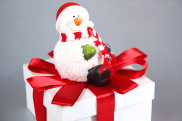 Christmas composition with gift box and decorations