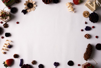 Christmas frame decorated with fir cones