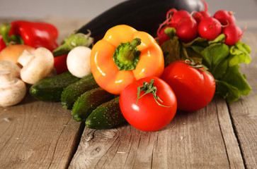 Fototapeta na wymiar Fresh vegetables on a clean wooden table