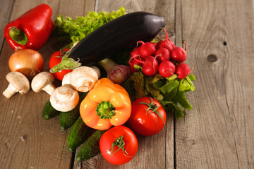 Fresh vegetables on a clean wooden table