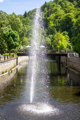 Naklejka premium Fountain in river Tepla in Karlovy Vary