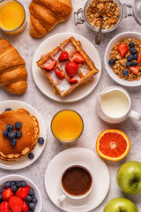 Delicious breakfast on a light table.